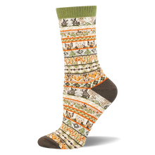 Off-white crew sock with an earthy sweater pattern showing bands of pixelated bears, foxes, owls, and green pine trees.
