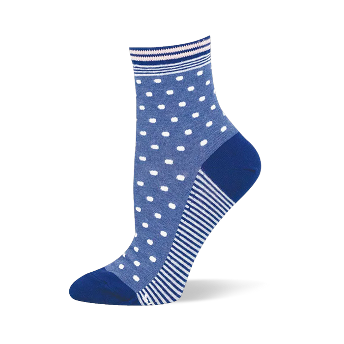 Medium blue crew sock featuring white pin dots on top and a striped sole, finished with a dark blue solid heel and toe.