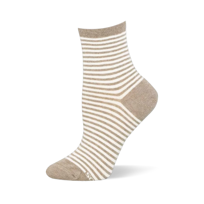 Ankle sock on a foot mannequin displaying horizontal tan and white stripes with solid tan color blocking on the heel and toe.