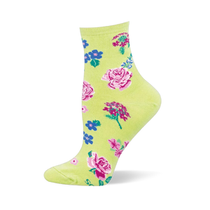 Light green sock with a cottage garden pattern showing pink roses, small blue flowers, magenta clusters, and green leaves.