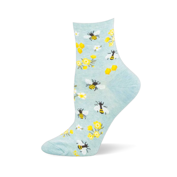 Light blue crew sock with yellow and black bees, golden honeycombs, yellow wildflowers, and white daisies.