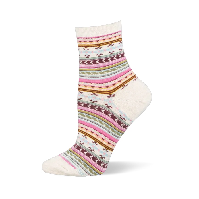Cream crew sock with horizontal serape stripes and geometric patterns in pink, green, maroon, brown, and light blue.