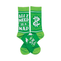 Crew socks, bright and lime green. One sock says 'All I Need Is A Nap,' the other has a dollar sign graphic and small sleeping figure.