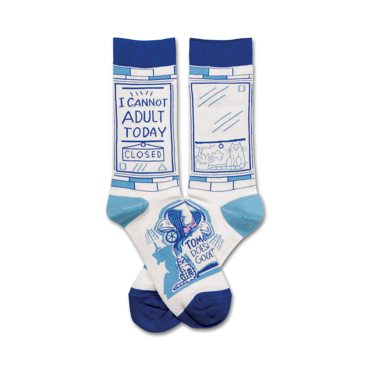 Pair of crew socks, white with blue accents. One sock says "I cannot adult today," the other features a cat illustration and "Tom Does Good."