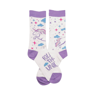 Crew socks; white base with lavender cuffs; features unicorns, stars, and clouds; 'Follow That Unicorn' text on sole.