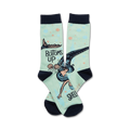 A pair of mint green crew socks featuring a whimsical illustration of a mermaid swimming upside down with seashells. The socks also say 'Bottoms Up'.