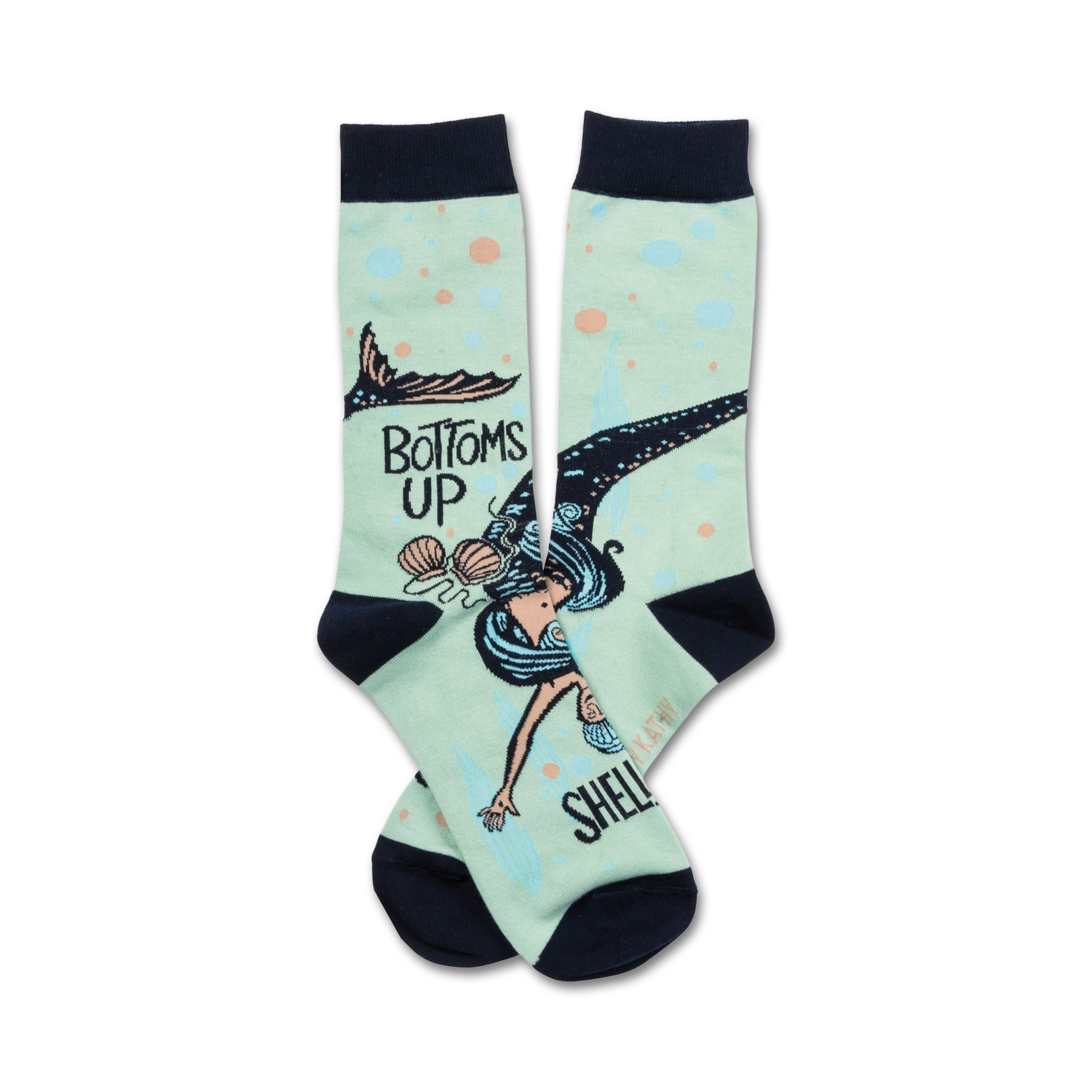 A pair of mint green crew socks featuring a whimsical illustration of a mermaid swimming upside down with seashells. The socks also say 'Bottoms Up'.
