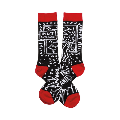 A pair of black crew socks with a red cuff.  The design features a white cartoonish figure, geometric shapes, and the text 'I'm not anti-social'.