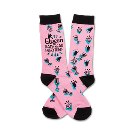 pink crew socks with black text "queen of damn near everything," wine glasses, and diamonds.  