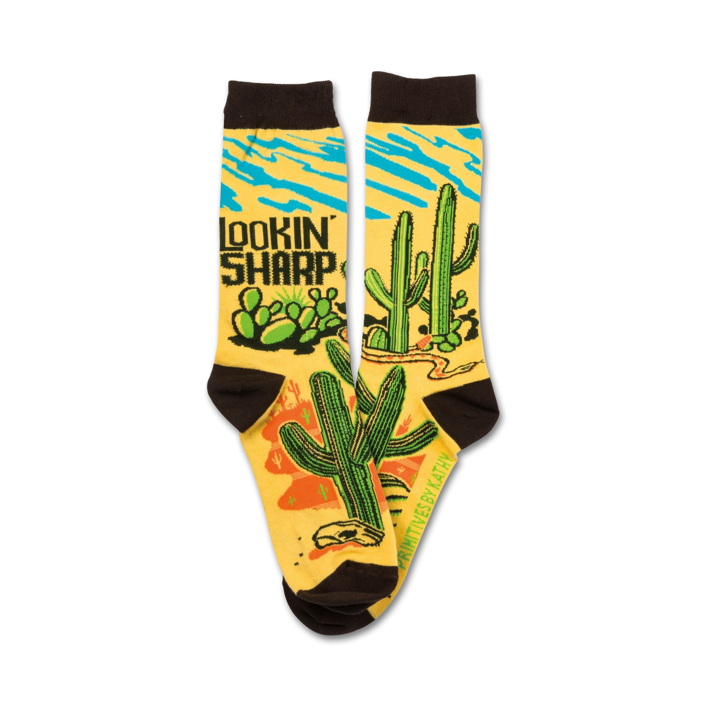 Pair of crew socks, mustard yellow with brown cuffs. Design features cacti, a snake, and the words 'Lookin' Sharp'.