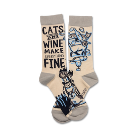 crew length women's socks in pink featuring cats, wine glasses, and the text "cats and wine make everything fine."   