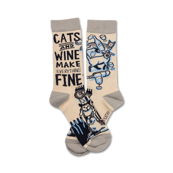 crew length women's socks in pink featuring cats, wine glasses, and the text "cats and wine make everything fine."   