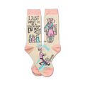 Cream crew socks with pink accents.  Features a design of cats and a woman with text that says 'I just want to be a stay at home cat mom.'