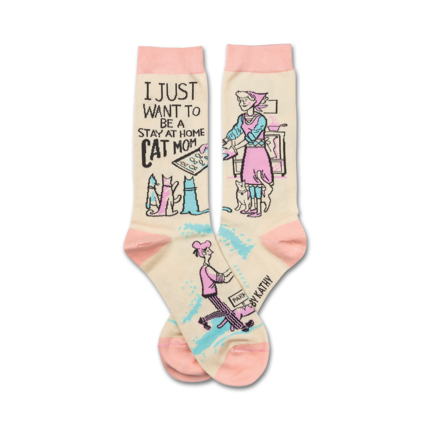 Cream crew socks with pink accents.  Features a design of cats and a woman with text that says 'I just want to be a stay at home cat mom.'