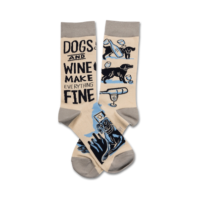 crew height white cotton blend novelty socks with an illustration of dogs and wine glasses, and the phrase "dogs and wine make everything fine" in blue. 