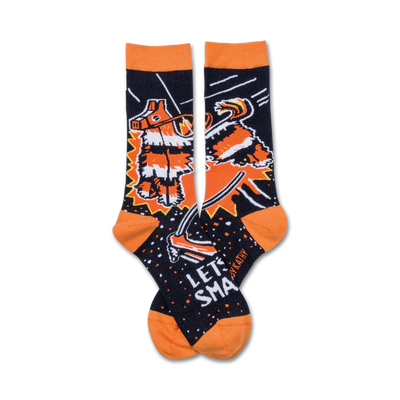 black crew socks with orange toe, heel, and cuff feature cartoon piã±ata being hit with a stick. let's smash text above the piã±ata.   