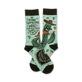 Pair of teal crew socks with a dark brown cuff.  Features a graphic of a cactus wearing a sombrero and the text 'Find someone who understands you'.