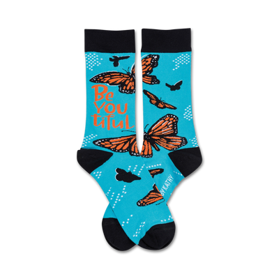 beyoutiful blue crew socks with orange, black, and white monarch butterflies. inspirational themed design for women.   