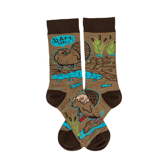 Crew socks in brown and teal.  Feature a cartoon beaver with a speech bubble that says 'Dam Girl!' and other beaver illustrations. }}