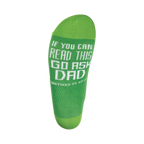 Close-up of the sole of the lime green sock, showing the text: 'If you can read this, go ask dad'.