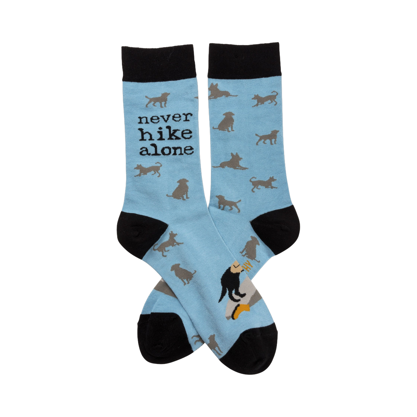 Crew socks in light blue with a repeating pattern of gray dog silhouettes. The text 'Never Hike Alone' is visible on one sock.