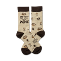 Cream crew socks with brown cuffs and whimsical illustrations of wine glasses, turkeys, and people. Text reads: 'These socks pair well with wine'.