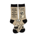 A pair of beige crew socks with black cuffs.  They feature a funny illustration of a man relaxing with wine and the text 'Good friends and wine are cheaper than therapy'.