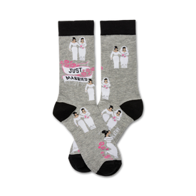 gray crew socks with black toe, heel, and cuff feature "just married" text and two brides holding hands pattern. made of cotton for women.  