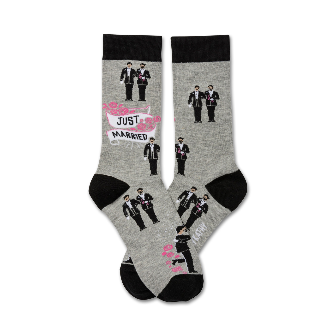 Two grey crew socks with black cuffs.  The socks show illustrations of two grooms in tuxedos, a 'Just Married' banner, and pink roses.
