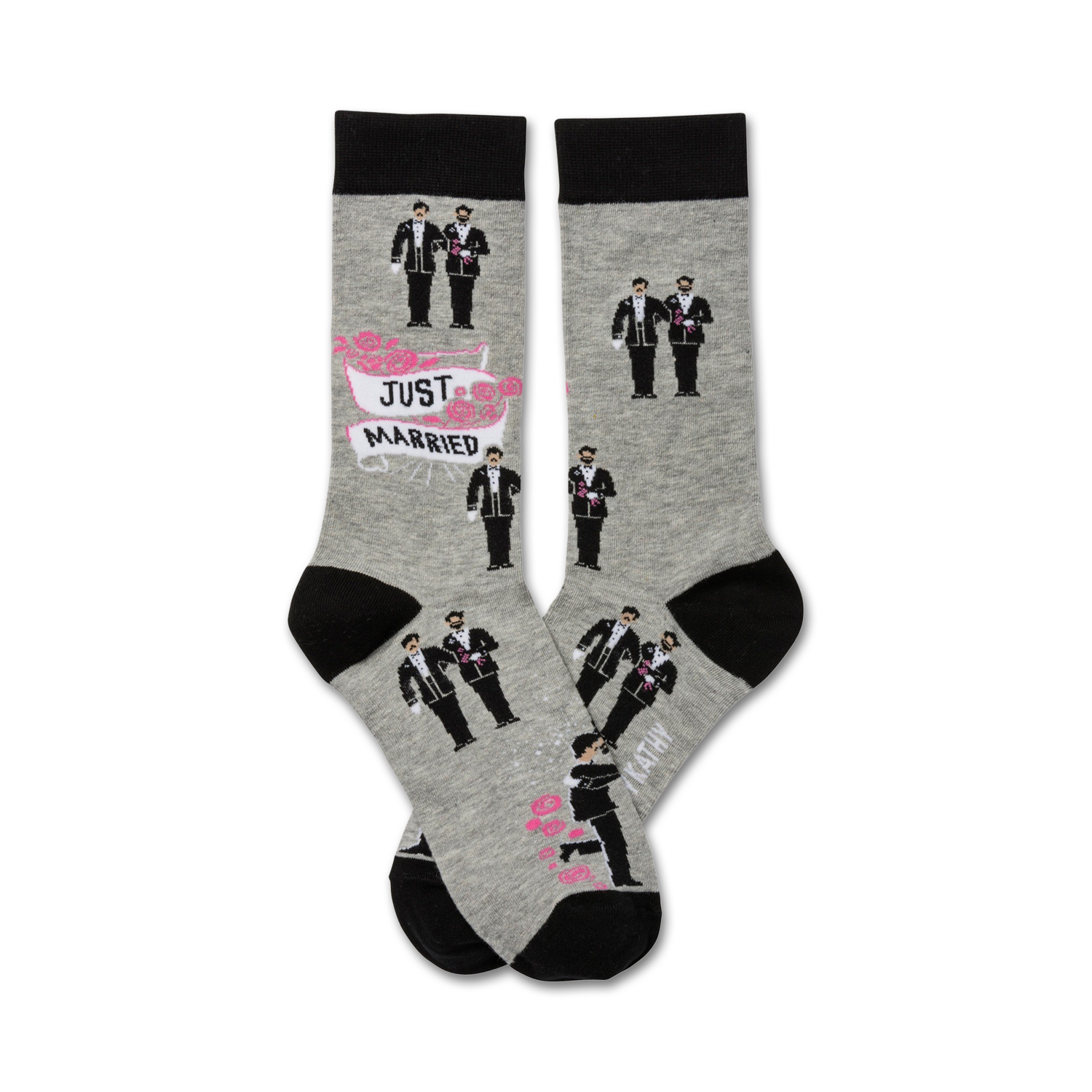 Two grey crew socks with black cuffs.  The socks show illustrations of two grooms in tuxedos, a 'Just Married' banner, and pink roses.
