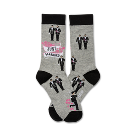 mens crew socks in gray with black toe, heel, and cuff. pattern of two grooms in black suits holding hands. 'just married' banner and 'two grooms' printed on sole.  