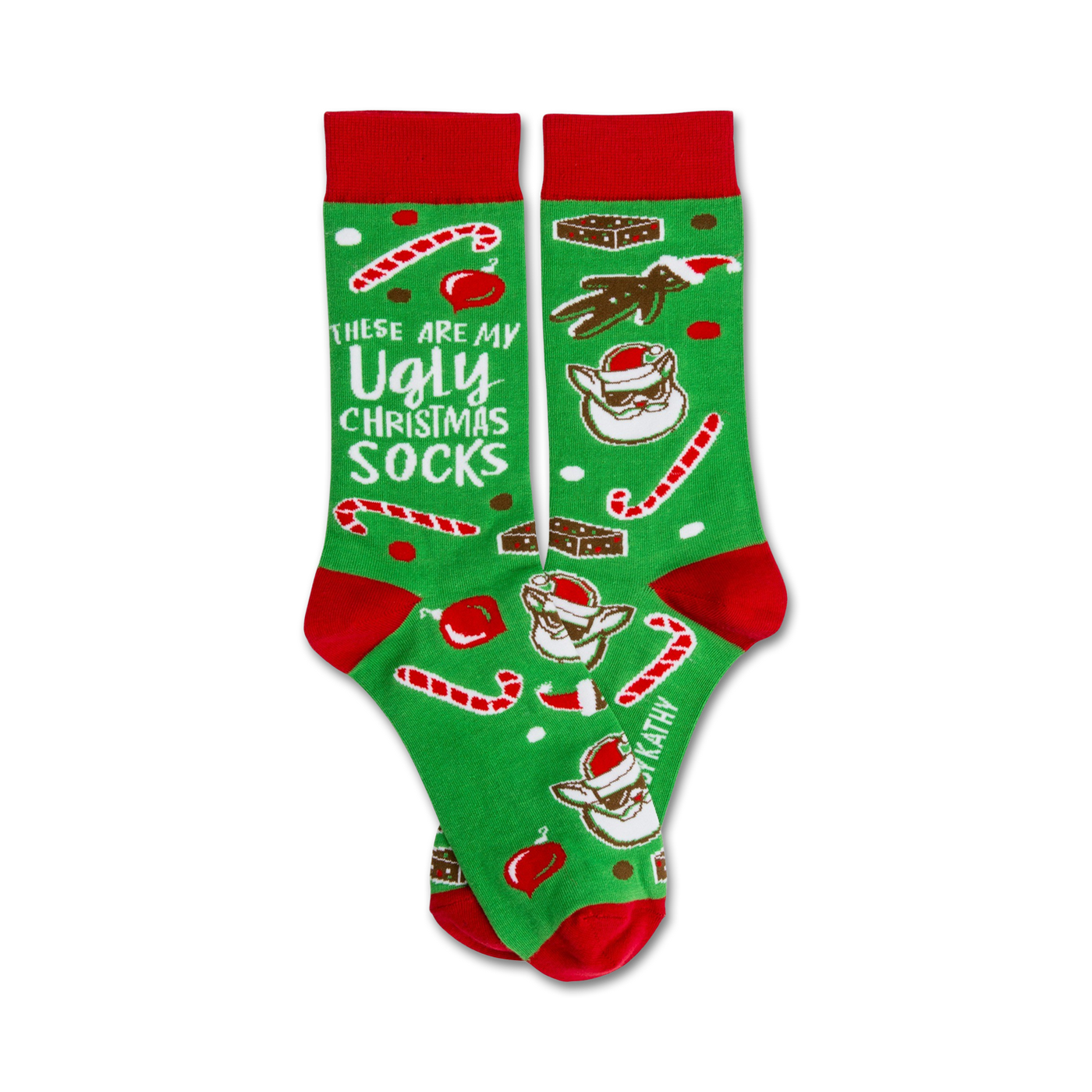 A pair of green crew socks with red cuffs. The socks are adorned with candy canes, brownies, and a funny Santa Claus design. The text 'These are my Ugly Christmas Socks' is featured.