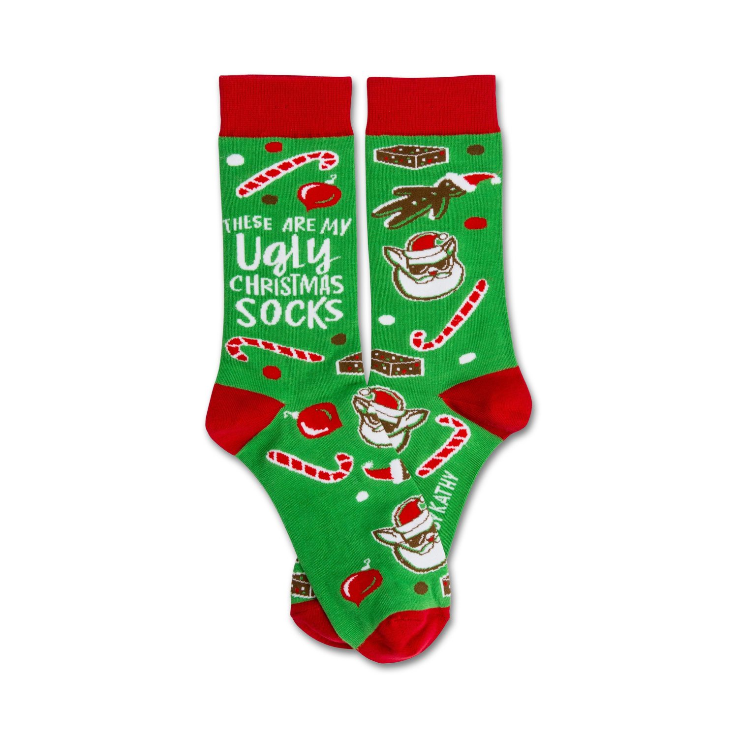 A pair of green crew socks with red cuffs. The socks are adorned with candy canes, brownies, and a funny Santa Claus design. The text 'These are my Ugly Christmas Socks' is featured.