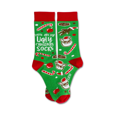   green and red christmas socks with white text "these are my ugly christmas socks." images include candy canes, presents, santa hats, and snowflakes.    