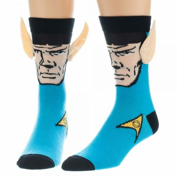 blue socks with black cuff and yellow star trek insignia on ankle. photo-realistic image of spock from shoulders up with hands together in front. spock's ears stick out above the sock cuff.   }}