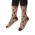 The toe and heel sections of the tan crew socks, highlighted by solid dark brown color blocks.
