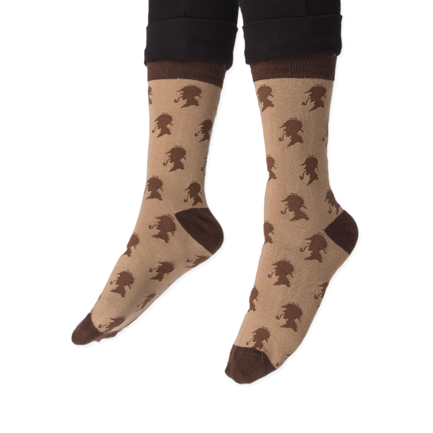 The toe and heel sections of the tan crew socks, highlighted by solid dark brown color blocks.