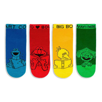 Four bright Sesame Street ankle socks in blue, red, yellow, and green showing characters reading books in black line art.