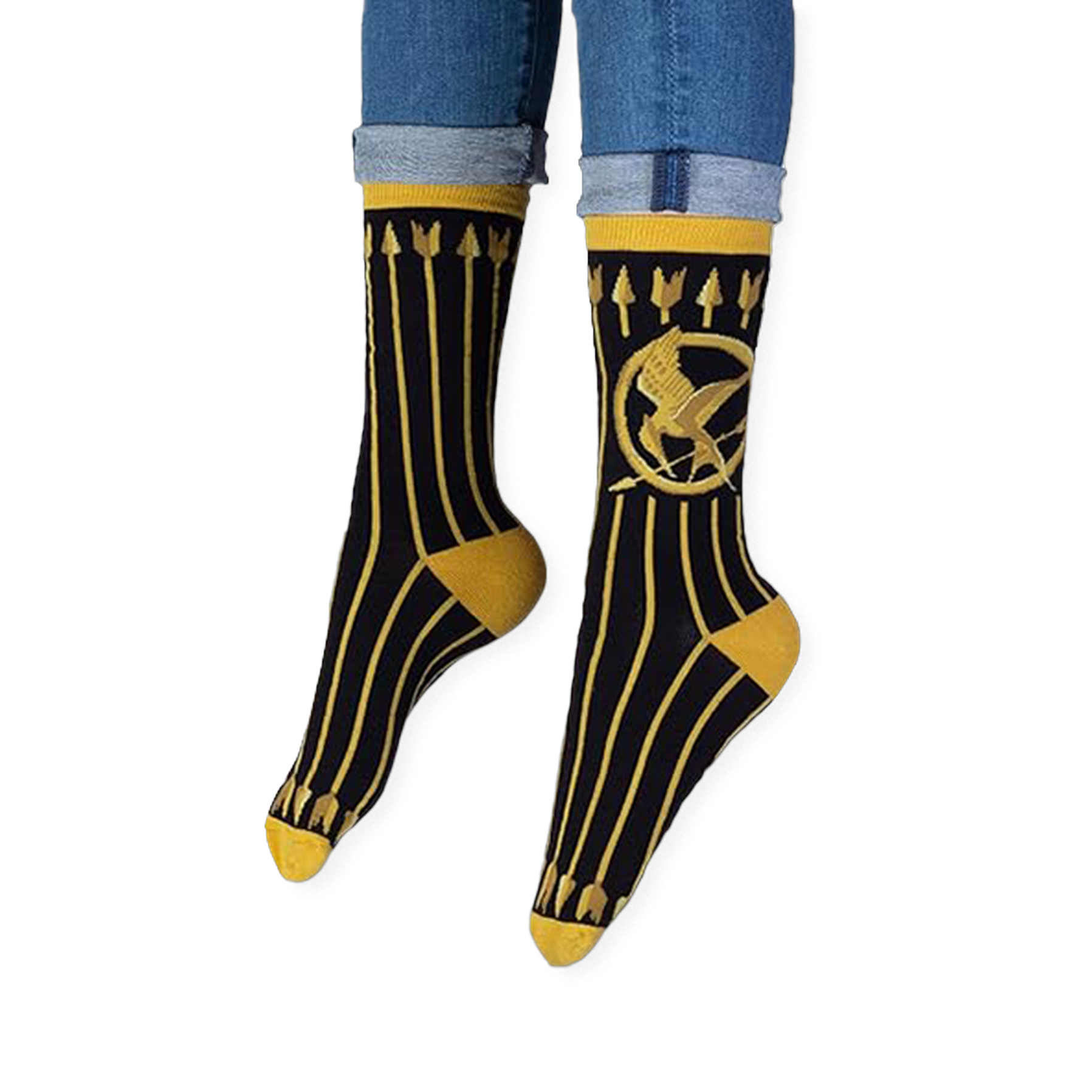 Lifestyle shot of someone wearing the black and gold Mockingjay socks with dark jeans and casual sneakers.