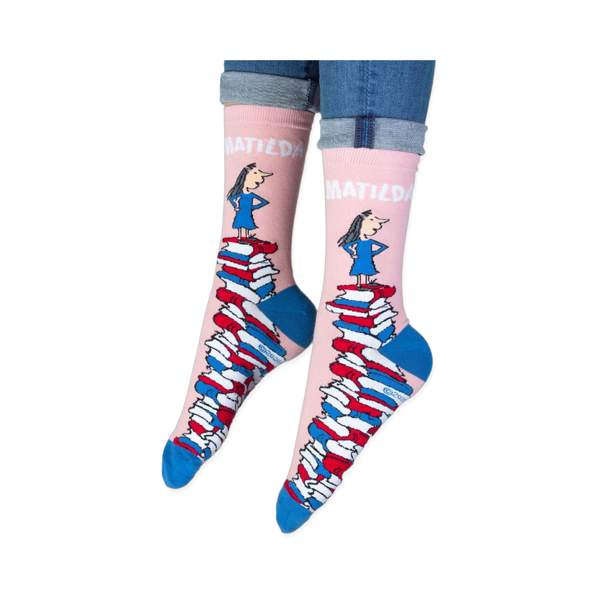 Close-up of the pink sock cuff showing bold white MATILDA text and the illustration of the girl.