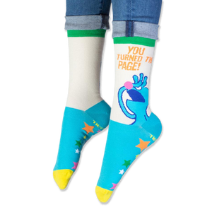 View of the cream and blue crew socks highlighting the bright green ribbed cuff at the top.