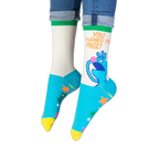 View of the cream and blue crew socks highlighting the bright green ribbed cuff at the top.
