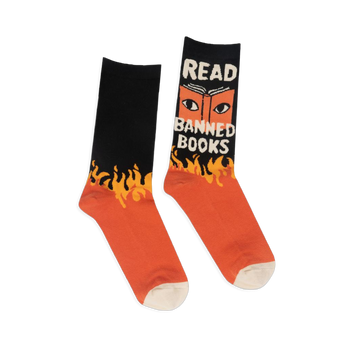 Black and orange crew socks with yellow flames. One shows an open book with eyes and the text READ BANNED BOOKS in white.