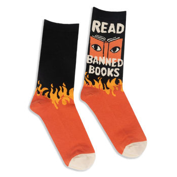 Black and orange crew socks with yellow flames. One shows an open book with eyes and the text READ BANNED BOOKS in white.