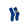 Lifestyle shot showing the Dog Man socks on a person's feet. 