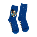 Pair of Dog Man crew socks. Blue background with white stars and illustrations of Dog Man and Petey. 