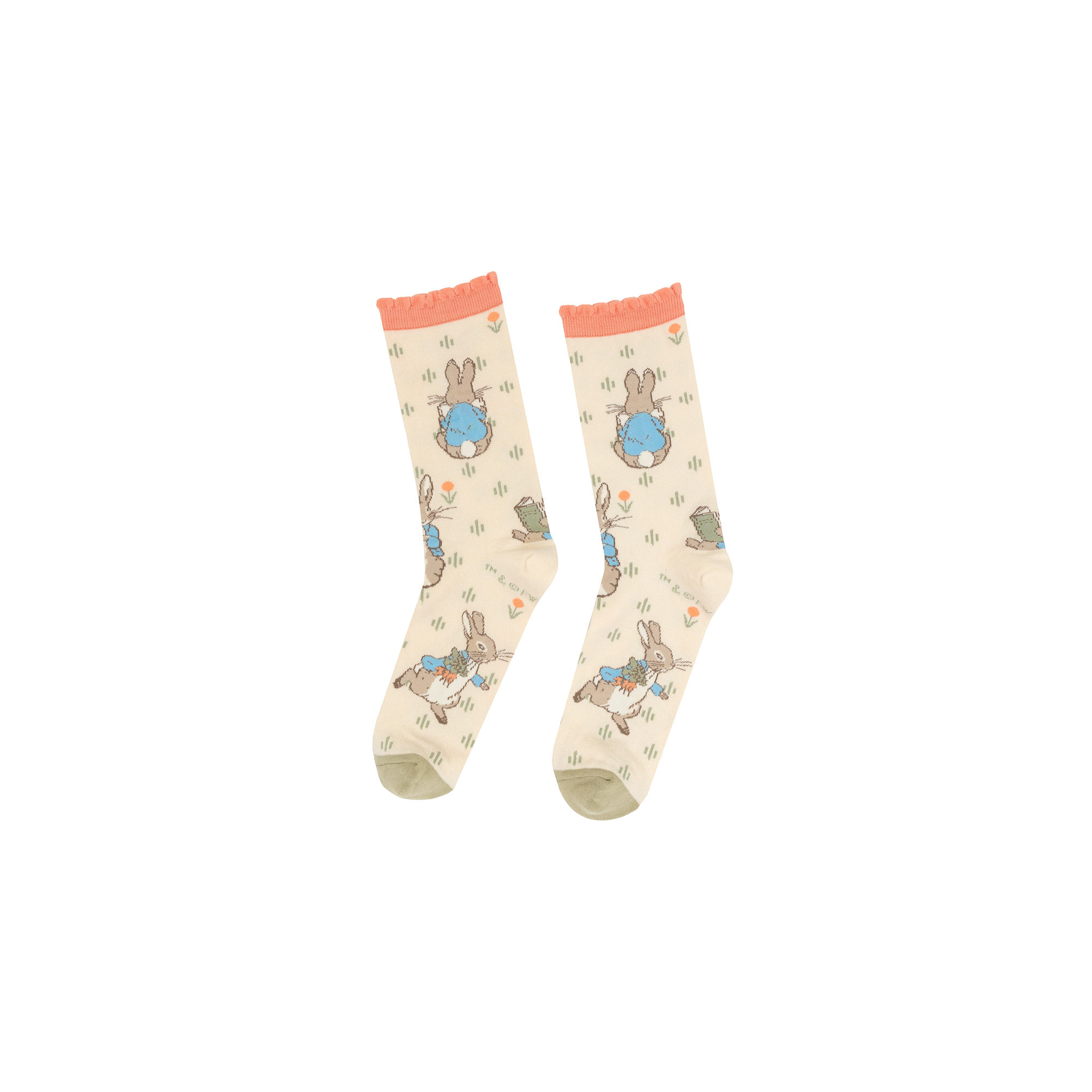 Pair of Peter Rabbit crew socks, light beige with peach ruffled cuffs and olive green toes, laid flat on a white background.