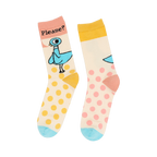 Lifestyle shot of Pigeon Pretty Please socks on a model's feet, showcasing how they look when worn.