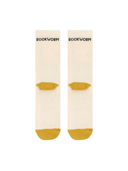 Close-up view of the Bookworm socks showing the mustard yellow heel and toe detail and the subtle 'Bookworm' text on the socks.