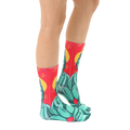 Side view of Buddha socks on a person's legs, showcasing the sock's design and fit. [lf]